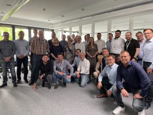Large group of employees from Plasman's Ludenscheid, Germany Sales & Engineering location