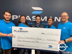 Plasman MVP employees from Plasman Cleveland Manufacturing holding a large cheque for ,000 for Alex's Lemonade Stand