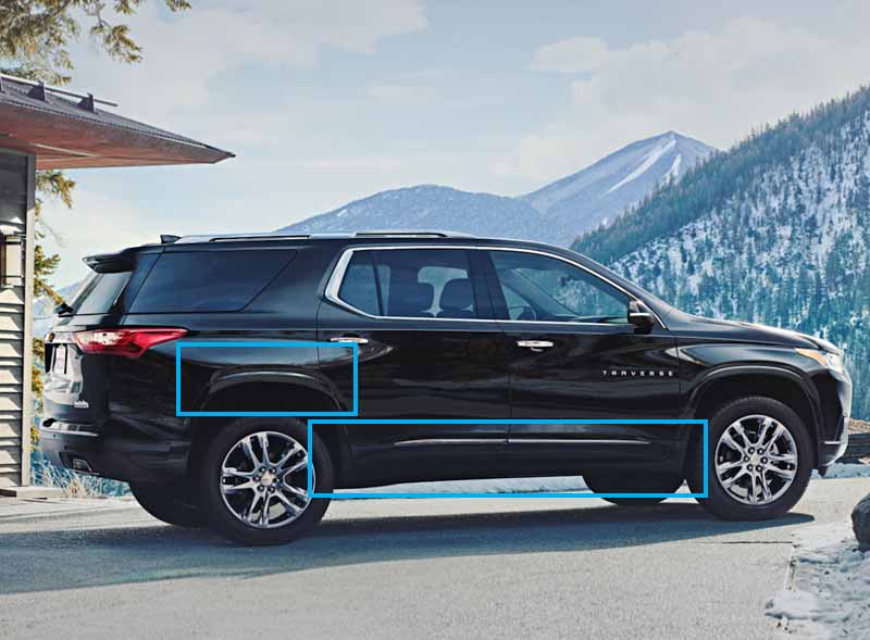 Black Chevy Traverse in snowy mountain area