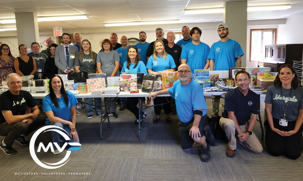 group photo with Plasman MVP Ambassadors and Maryvale representatives standing around the donations